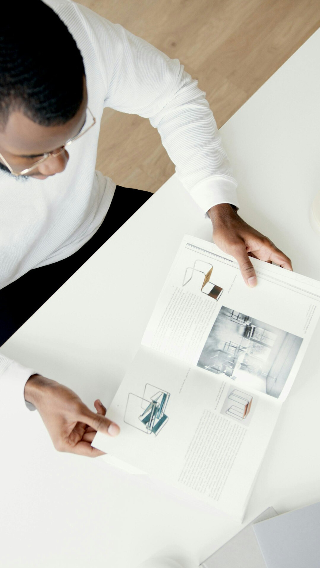 person reading corporate sustainability report